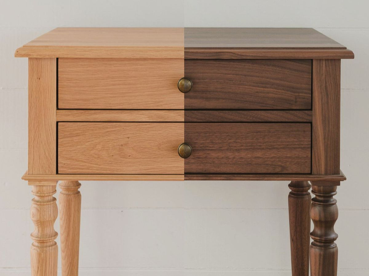 A chloe bedside table in oak and walnut grain split down the middle