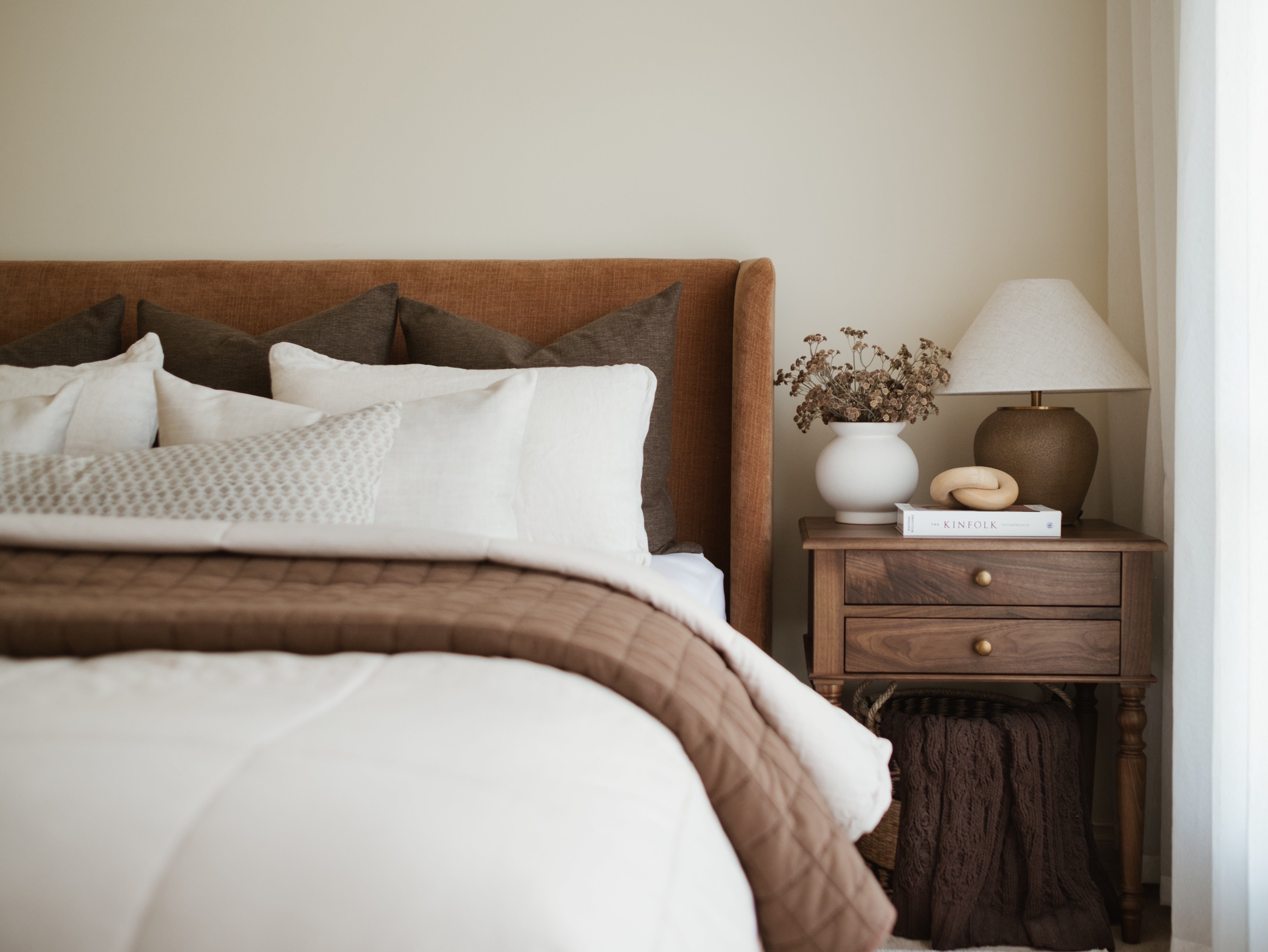 Chloe bedside in walnut adjacent chocolate brown bed. The perfect bedroom suite combination.